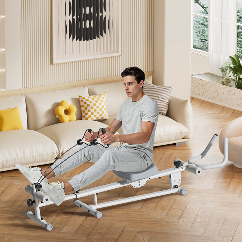Man using a rowing machine in a living room setting