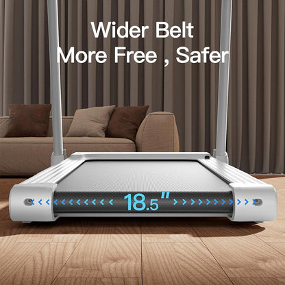 Treadmill with a wider belt in a room with a couch and curtains.